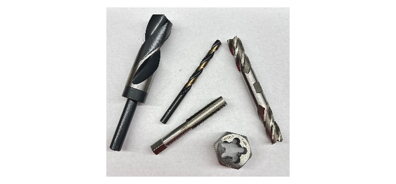 Drill bits, a tap, and a die